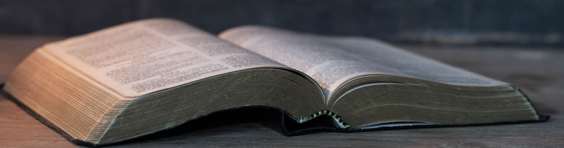 Open Bible sitting on a table